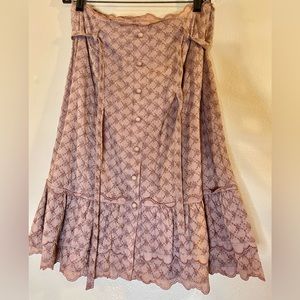 Cute, mauve, knee length, eyelet lace  skirt from Anthropologie.
